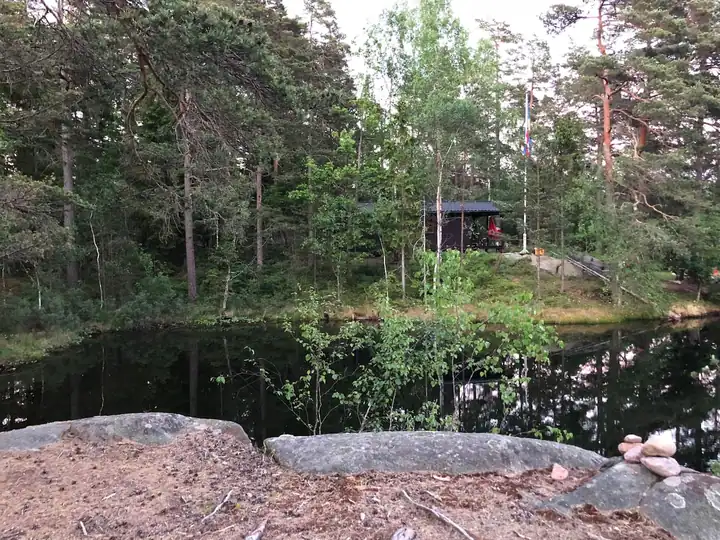 View over the lake towards the cabin
