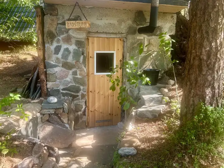 The sauna door and the path down