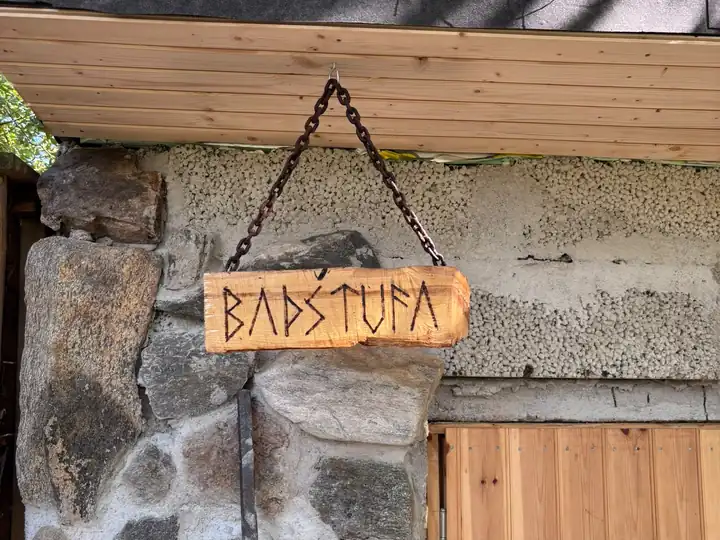 The hand-carved Badstufa sign